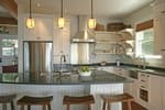 Kitchen with Cabinets and Wooden Flooring - Kitchen Renovation by Urban Construction and Development