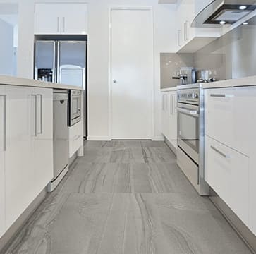 Modern White Kitchen by Urban Construction and Development - Kitchen Renovation Mississauga